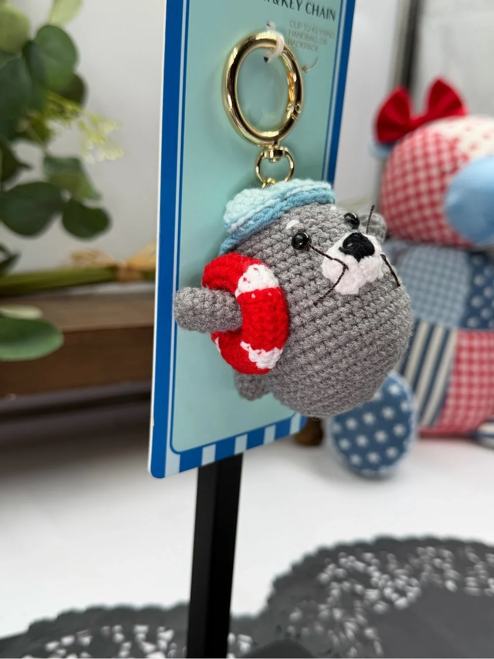Piper Gray Crocheted Seal Keychain with Light Blue Hat and Red Life Ring